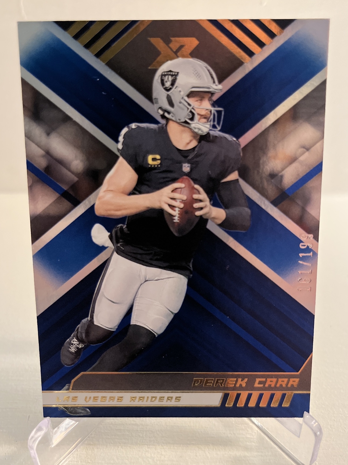 2022 Panini XR Blue /199 Derek Carr #46