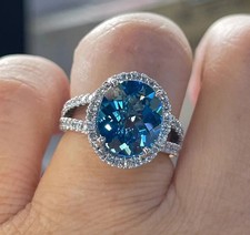 2Ct Oval Cut Lab Created Blue Topaz Halo Engagement Ring 14K White Gold Plated