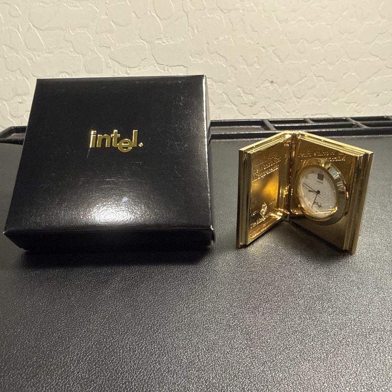 Real Intel 4004 CPU die on the watch face on Anniversary Clock 1996 from Intel/1