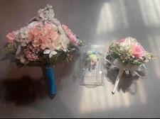 Large wedding bouquet with matching toss bouquet and boutonni re.
