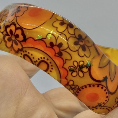 Vtg 70s MOD Yellow Orange Lucite Floral Star Inclusion Wavy Bangle