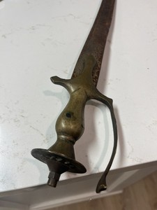 Possibly a Indian Tulwar Curved saber. Would be grateful on a better insight
