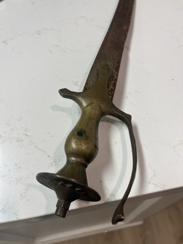 Possibly a Indian Tulwar Curved saber. Would be grateful on a better insight