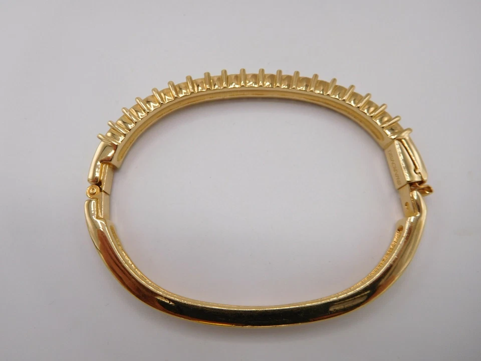 Brazalete Swarovski con bisagras ovalado chapado en oro B44 Foto 2 de 4