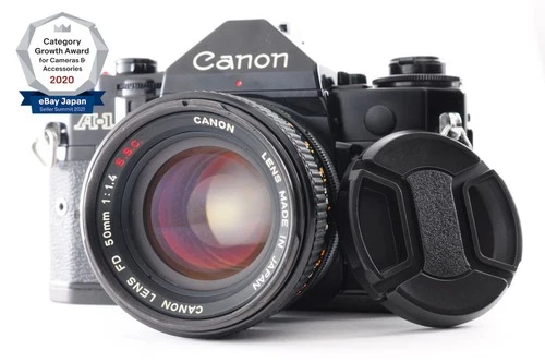 **NEAR MINT-** Canon A-1 Black 35mm SLR + FD 50mm f/1.4 S.S.C. w/ Cap From Japan