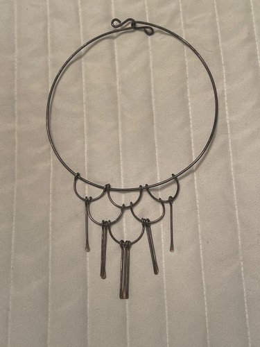 a mid-century modern choker necklace
