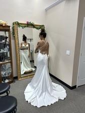 White Sleeveless V Neck Mermaid Satin Wedding Dress with Strappy Back and Train