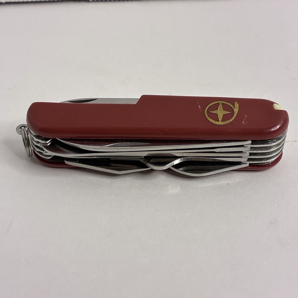 A complete vintage Diamond Superior multi-tool knife in red — a clean, old-school everyday carry piece with real retro charm.
