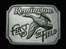 OC21136 NOS VINTAGE 1980  REMINGTON FIRST IN THE FIELD  GUN  HUNTING BUCKLE