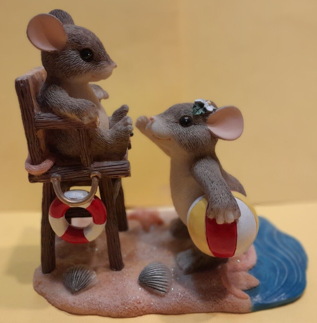 Charming Tails, A Real Lifesaver. Little mouse is the lifeguard at the beach
