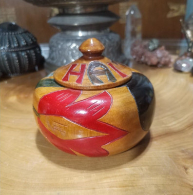 Carved, hand etched, painted wood trinket box from Haiti. elephant & red flower