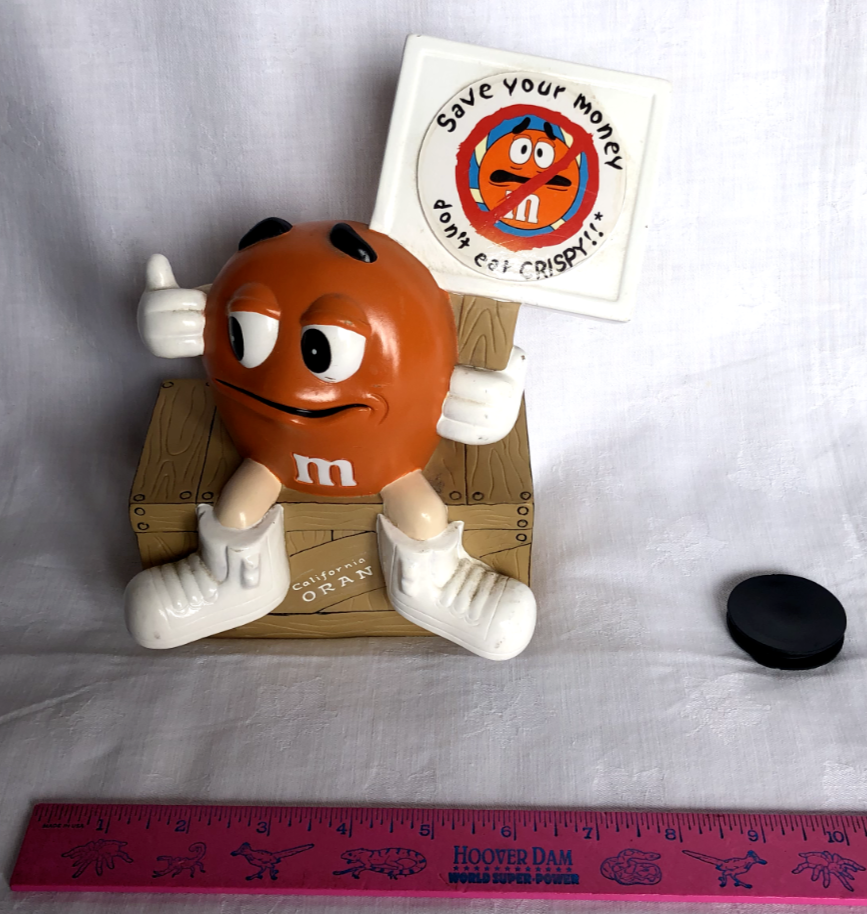 COIN BANK FEATURING CRISPY M & M MASCOT & SIGN SAVE YOUR MONEY DON'T EAT CRISPY