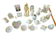 22 piece Precious Moments Collection with small plates, music, and figurines