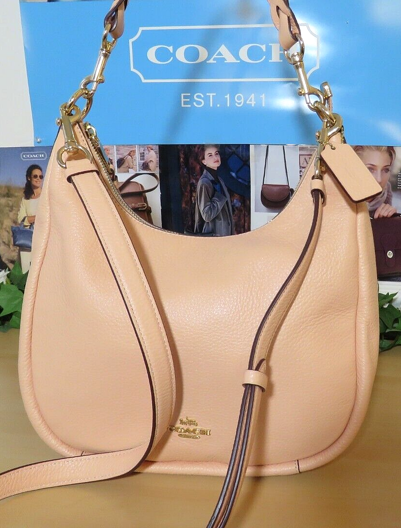 Stunning! COACH Pretty-in-Peach Leather CRESCENT Crossbody