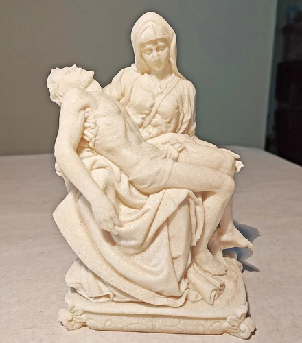 Reproduction of The Vaticans La Pieta by Michelangelo Cast Marble Statue