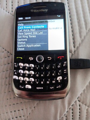 Blackberry Phone ATT Plastic Is Sticky Comes On Has Charger