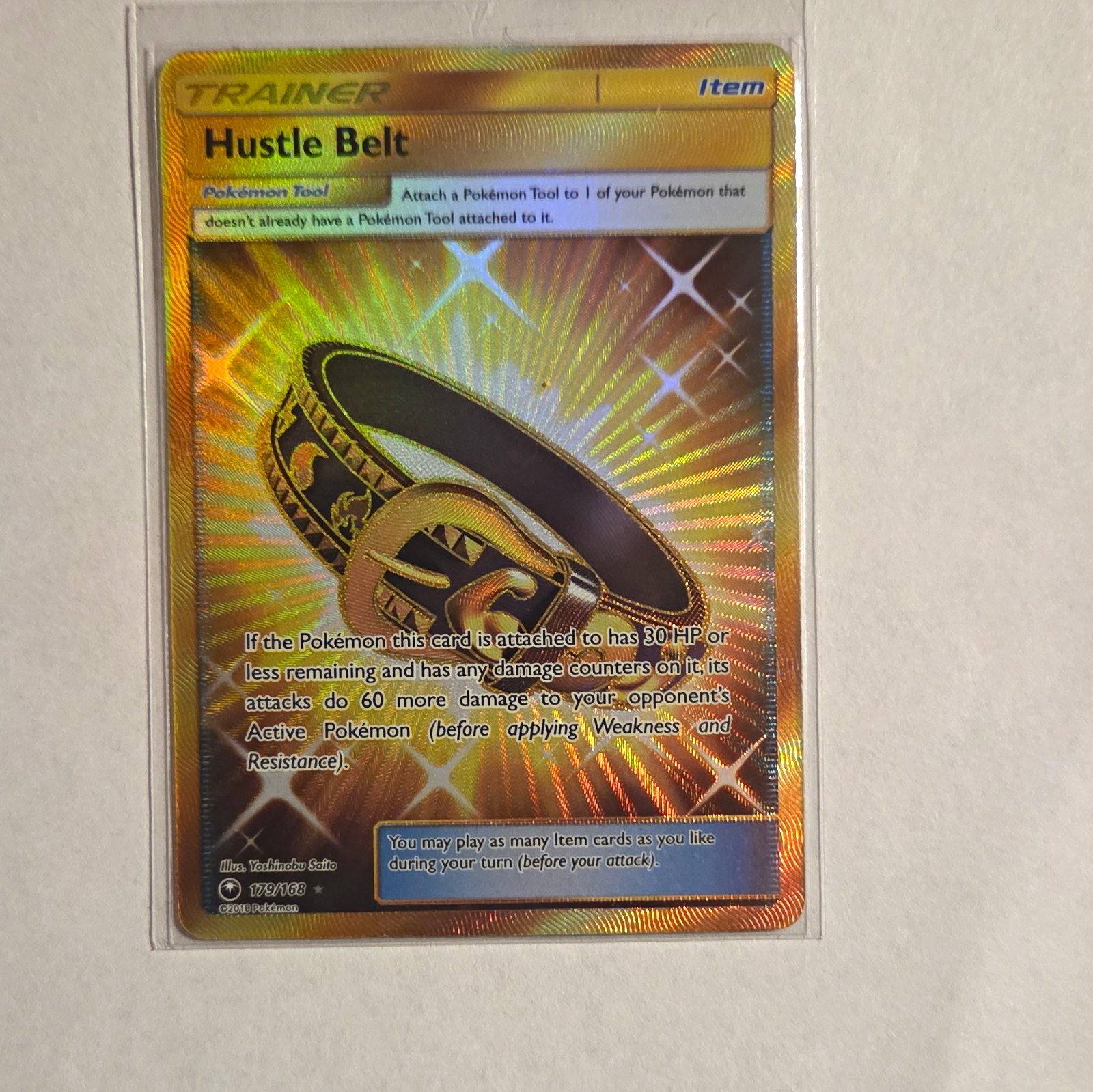 The Pokémon Company Hustle Belt 179/168 Sm-Celestial Storm Secret Rare Holo ENG