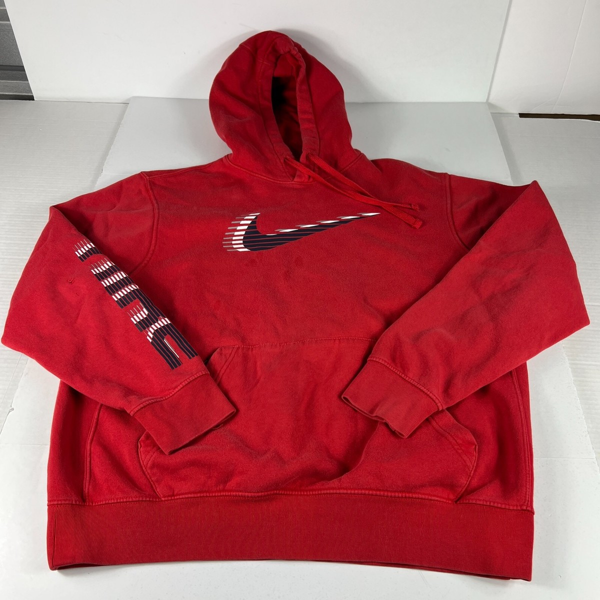red nike hoodie with checks all over