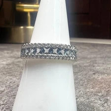 Ring Bomb Party Ring, NWOT size 7 blue gemstones surround silver color band