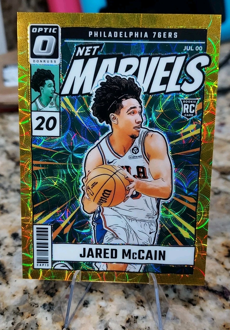 /10 Gold 2024-25 Donruss Optic Jared McCain #23 RC Net Marvels Gold /10