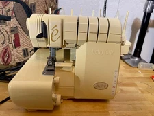Baby Lock Evolve BLE8 Serger Sewing Machine With Travel Case and Pedal