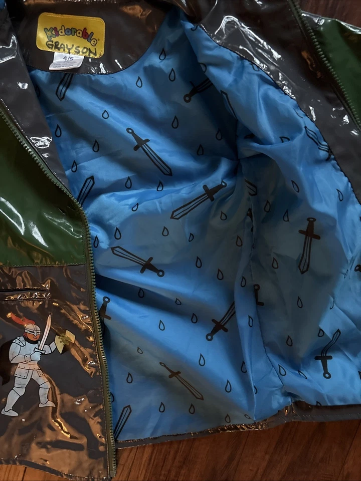 KIDORABLE DRAGON KNIGHT RAINCOAT, SIZE 4/5 100% POLYESTER, 100% NYLON LINING NNB - Image 4 of 4