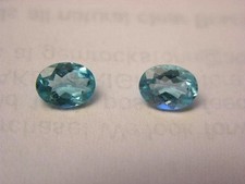 Apatite gemstone pair bright neon Paraiba blue faceted 8x6 oval 1.25 ct each