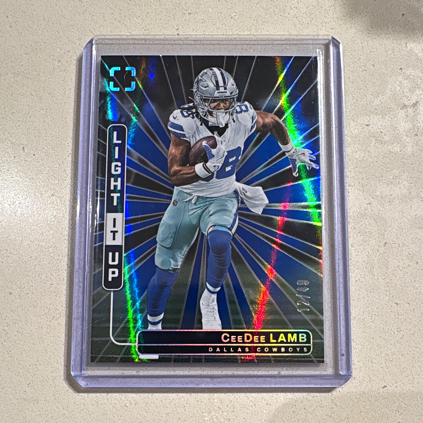 CeeDee Lamb #11 12/49 Blue Light It Up Panini Photogenic 2025