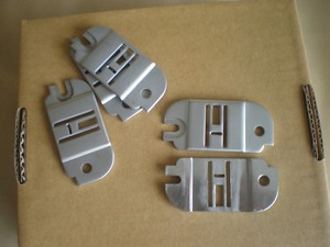 Nähmaschine Ersatzteile.Singer,Fußnadelplatten. 4 links