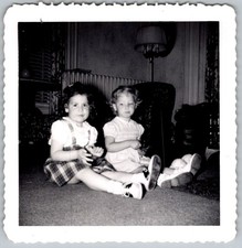 Vtg B&W Snapshot Two Little Girls In Plaid And Smocked Dresses On Floor 1950s