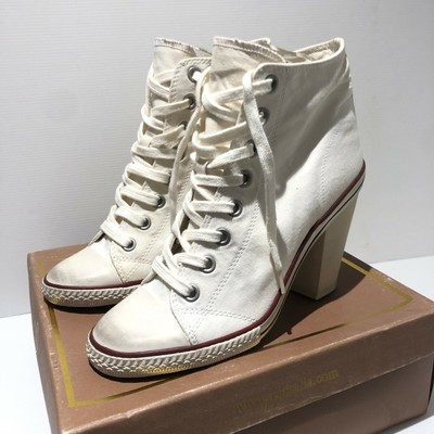 white heeled trainers