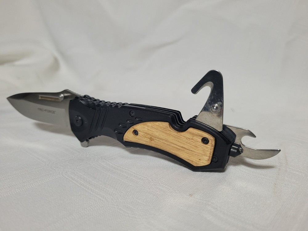 Multi tool with can opener tac force knife
