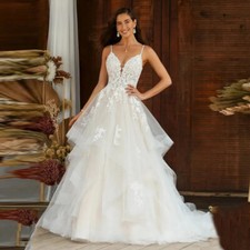 Beach A-Line Wedding Dresses Spaghetti Straps Appliques Backless Bridal Gowns