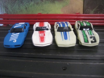 NEW Tyco Ho Slotcar  Lot of 4 Corvettes  2 glow in the dark and 2 don't!!!