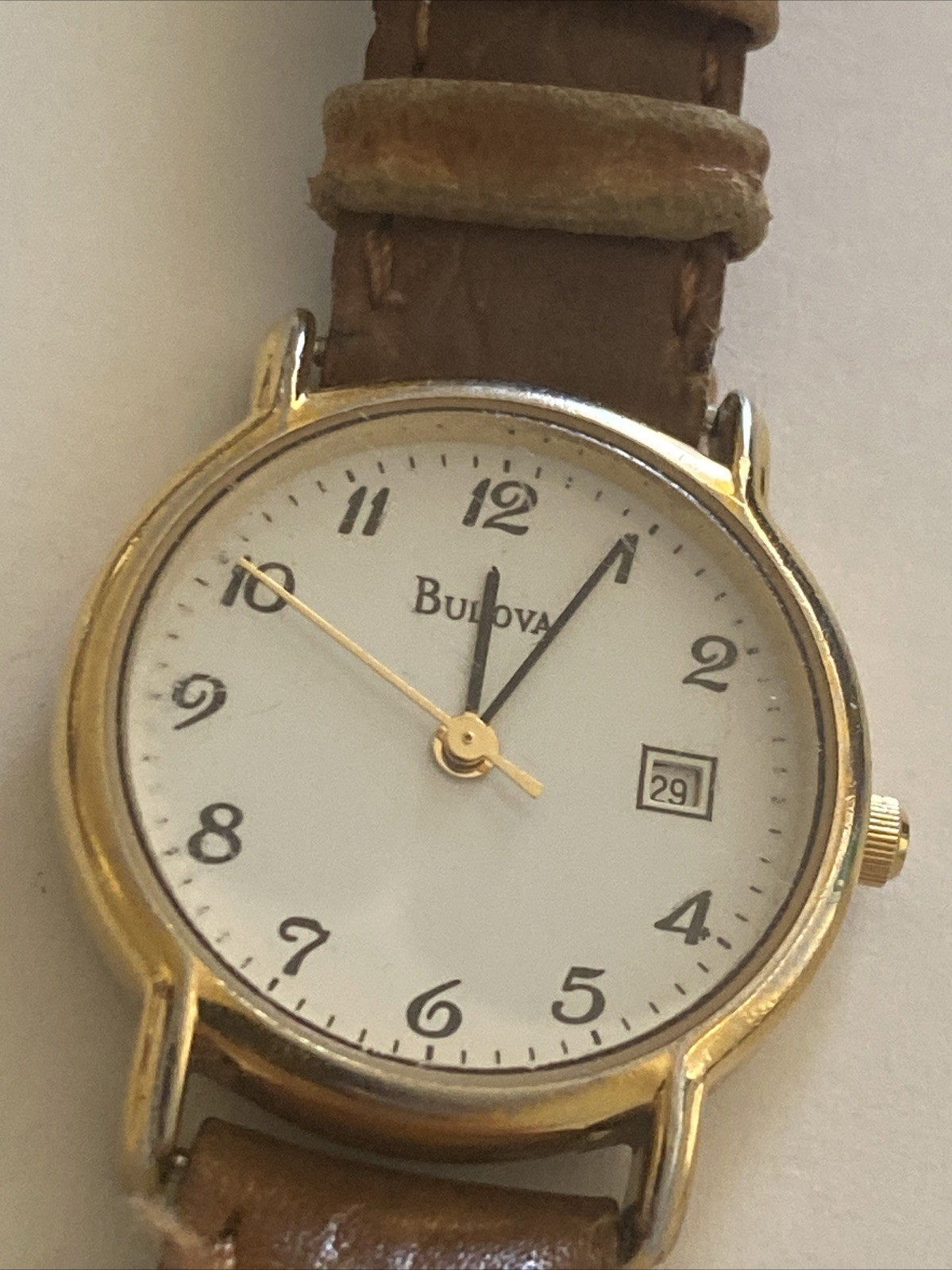 Vintage Bulova Gold-Tone Quartz Watch with Brown Leather Band & Date Function