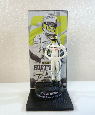 Figure 1/43 Jenson Button Brawn GP 2009 World Champion Formula 1 + Podium