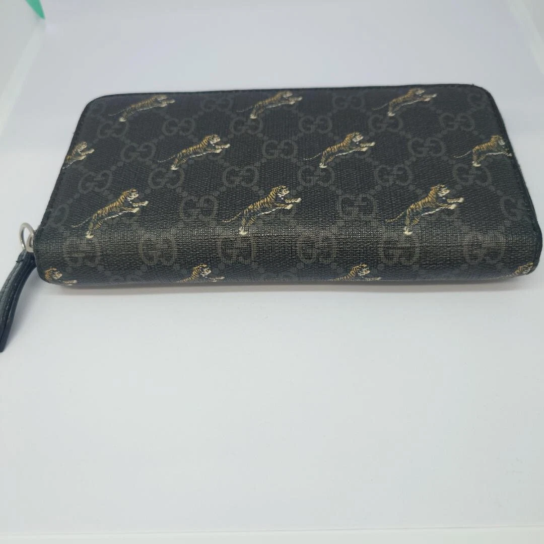 Portefeuille long GUCCI 575135 zippé autour imprimé tigre noir GG Supreme cuir/PVC