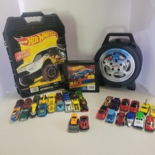 3 Hot Wheels cases and cars, 18 hotwheels, 2 matchbox, 12 others