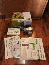 Canon Power Shot Digital Camera S1 IS W/ Box, Manual,  & Inserts Tested Cleaned