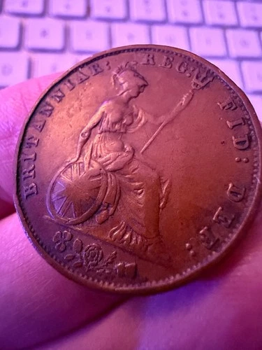 1854 Victoria Half Penny — photo from another recent sale