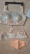 bridal lehenga choli set, pastel pink, pearl colored with mirror sequences