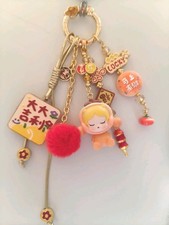 New Authentic Pop Mart New Year Sitting Series Skullpanda Bean Phone Bag Charm