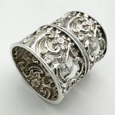 PAIR VICTORIAN REPOUSSE NAPKIN RINGS STERLING SILVER CHESTER 1897/98 N&H