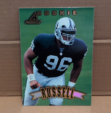 1997 Pinnacle #164 Darrell Russell Oakland Raiders NFL Rookie Football Card. rookie card picture