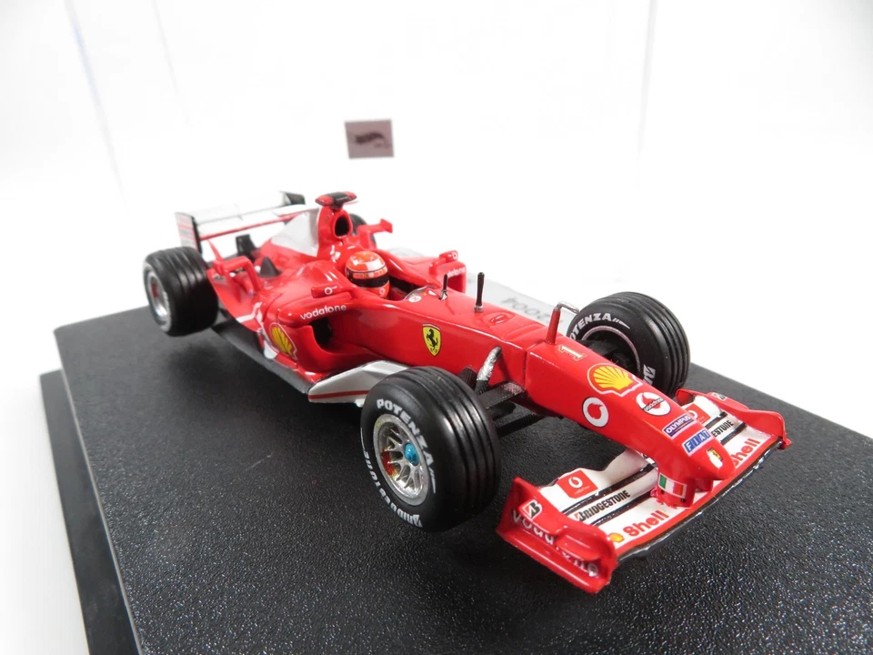 1:43 Hot Wheels Ferrari F2004 M. Schumacher F1 Rennwagen  - Bild 3 von 4