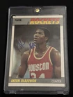 Hakeem “Akeem” Olajuwon 1987-88 Fleer #80 - JSA Authentic AUTO, Houston Rockets