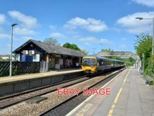 PHOTO  TROWBRIDGE STATION  AT THE PLATFORM IS CLASS 166 'NETWORK EXPRESS TURBO'