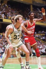 Boston Celtics' center Larry Bird guards 1980's Basketball photo
