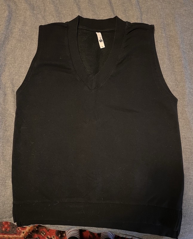 black sweatshirt vest
