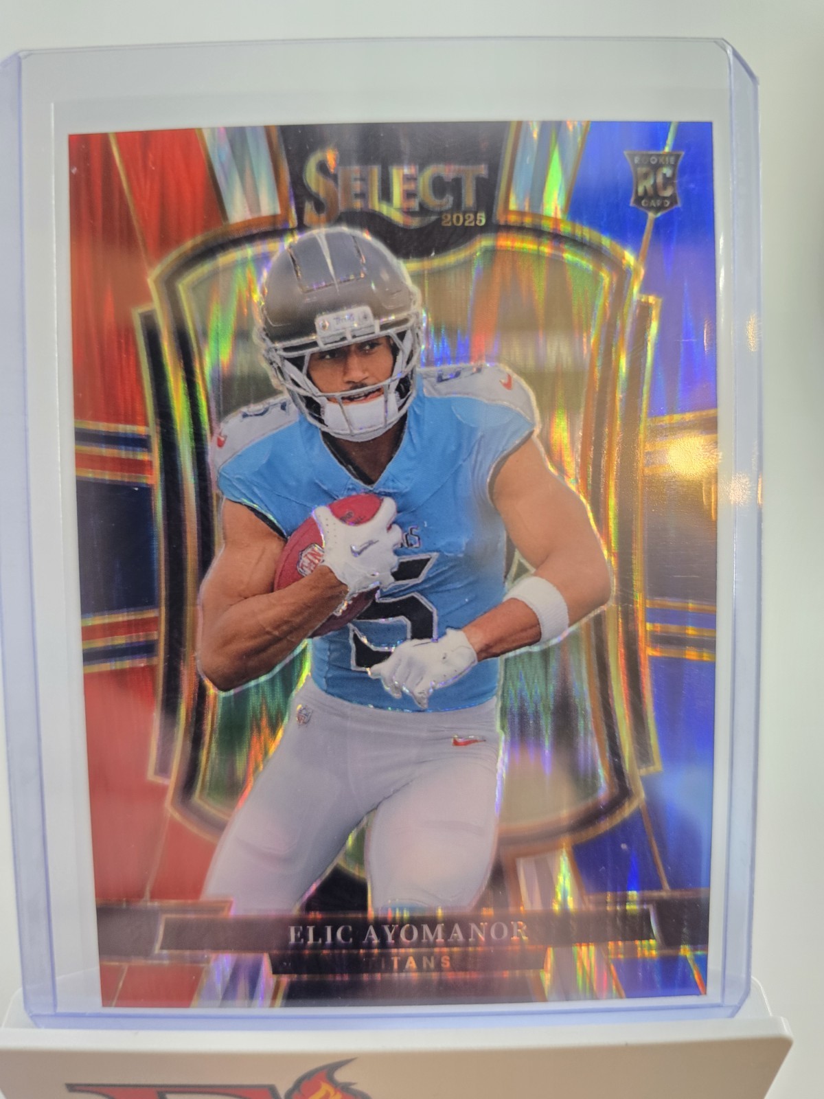 2025 Select #127 Premier Level Red & Blue Shock Prizm Elic Ayomanor (RC) Titans